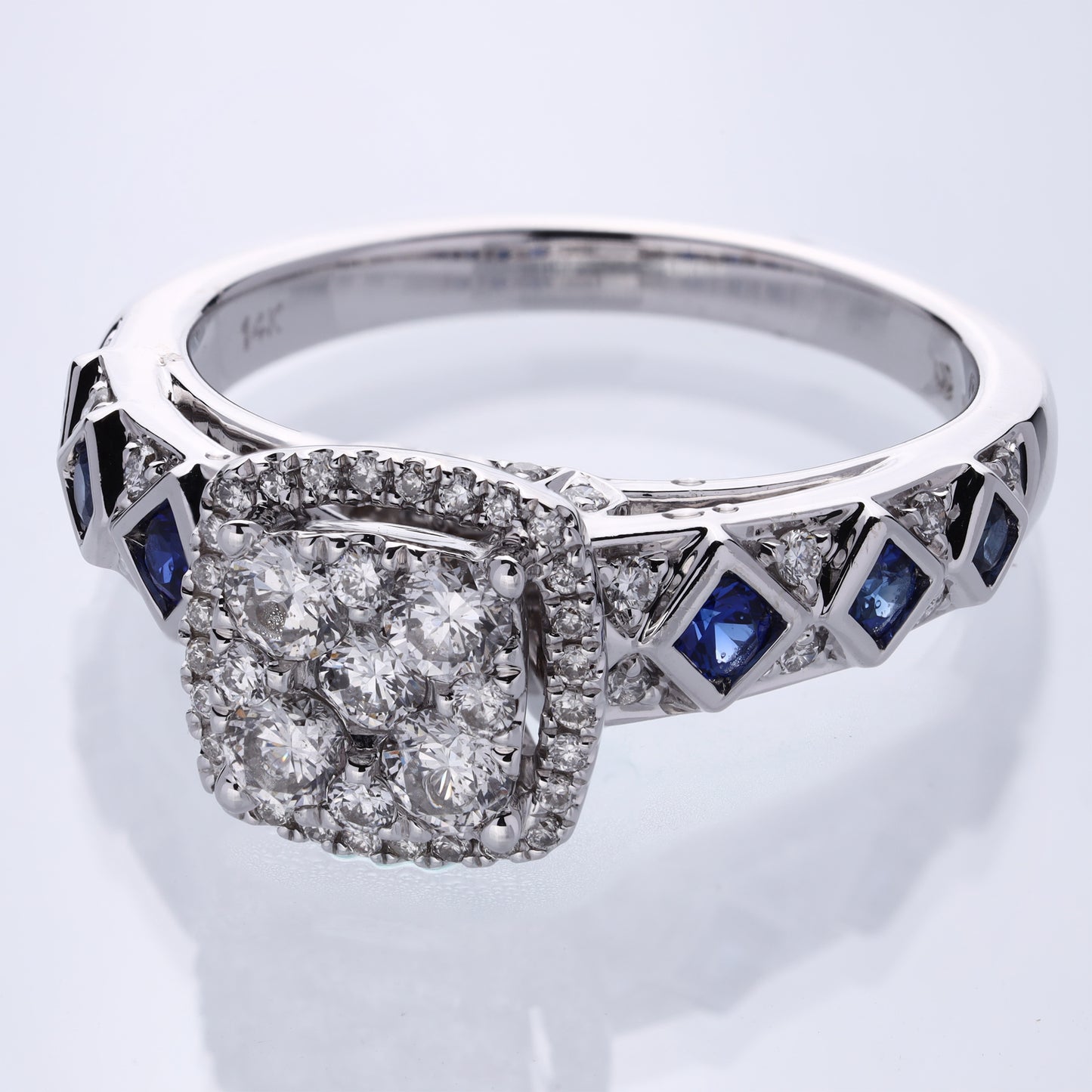 Mined diamond Sapphire Gemstone Ring weighing 5.78Gms with 0.642 Carat Diamonds and set in 14KT Gold